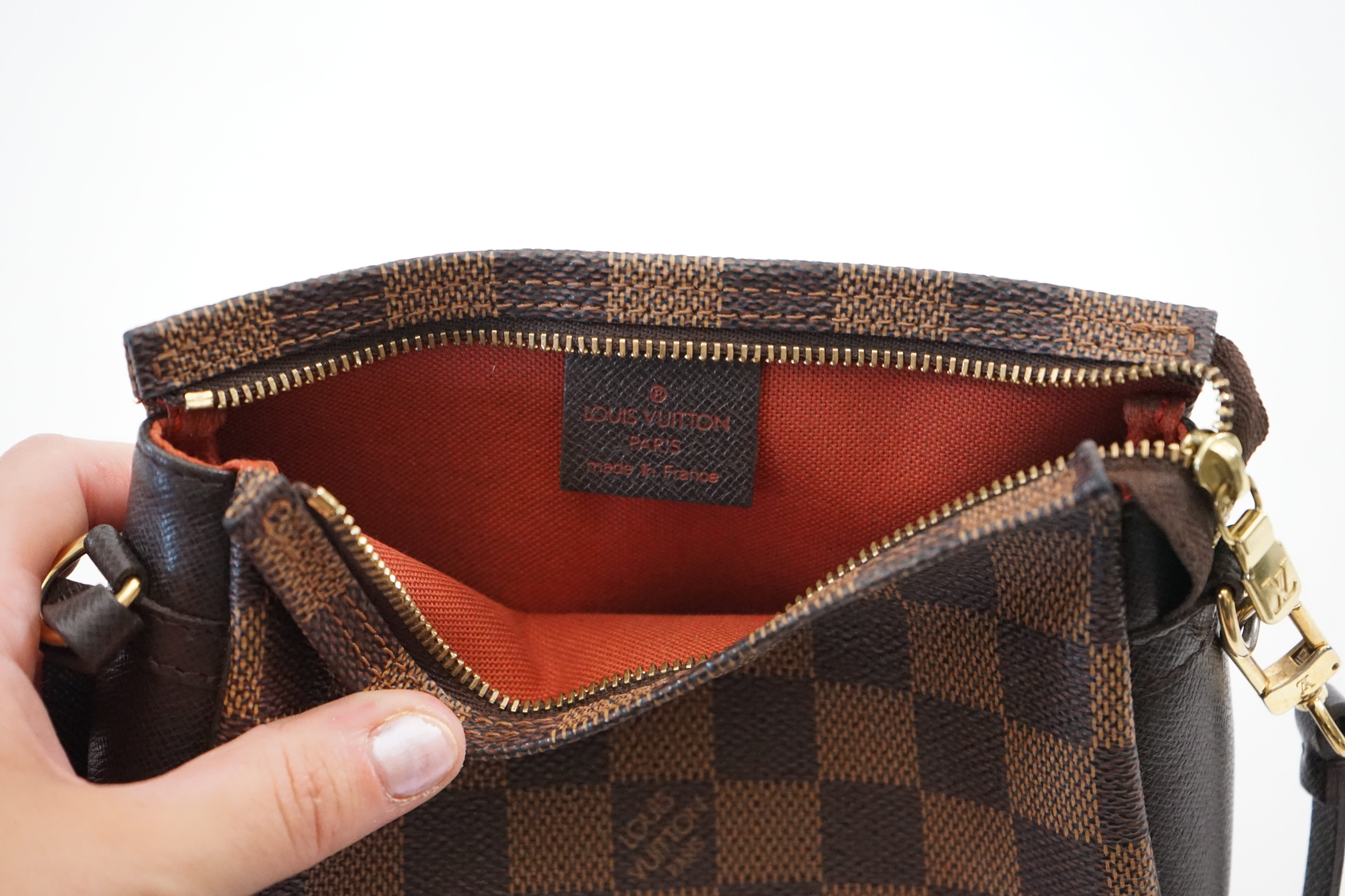 A Louis Vuitton Damier Ebene Pochette accessories bag, width 16cm, max depth 5cm, height 14cm
